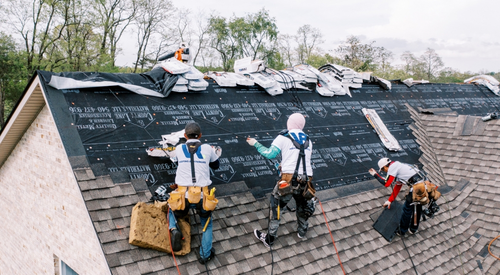 Roof Replacement team installing a new roof
