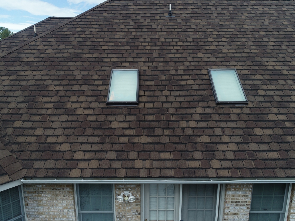 Two skylights on a roof.
