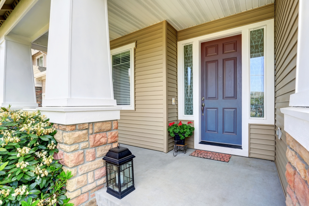 Front door and porch of a house.