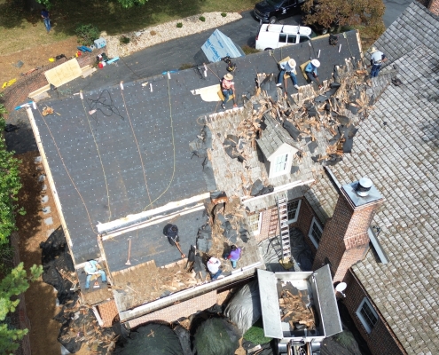 aerial view of a new roof installation in process.